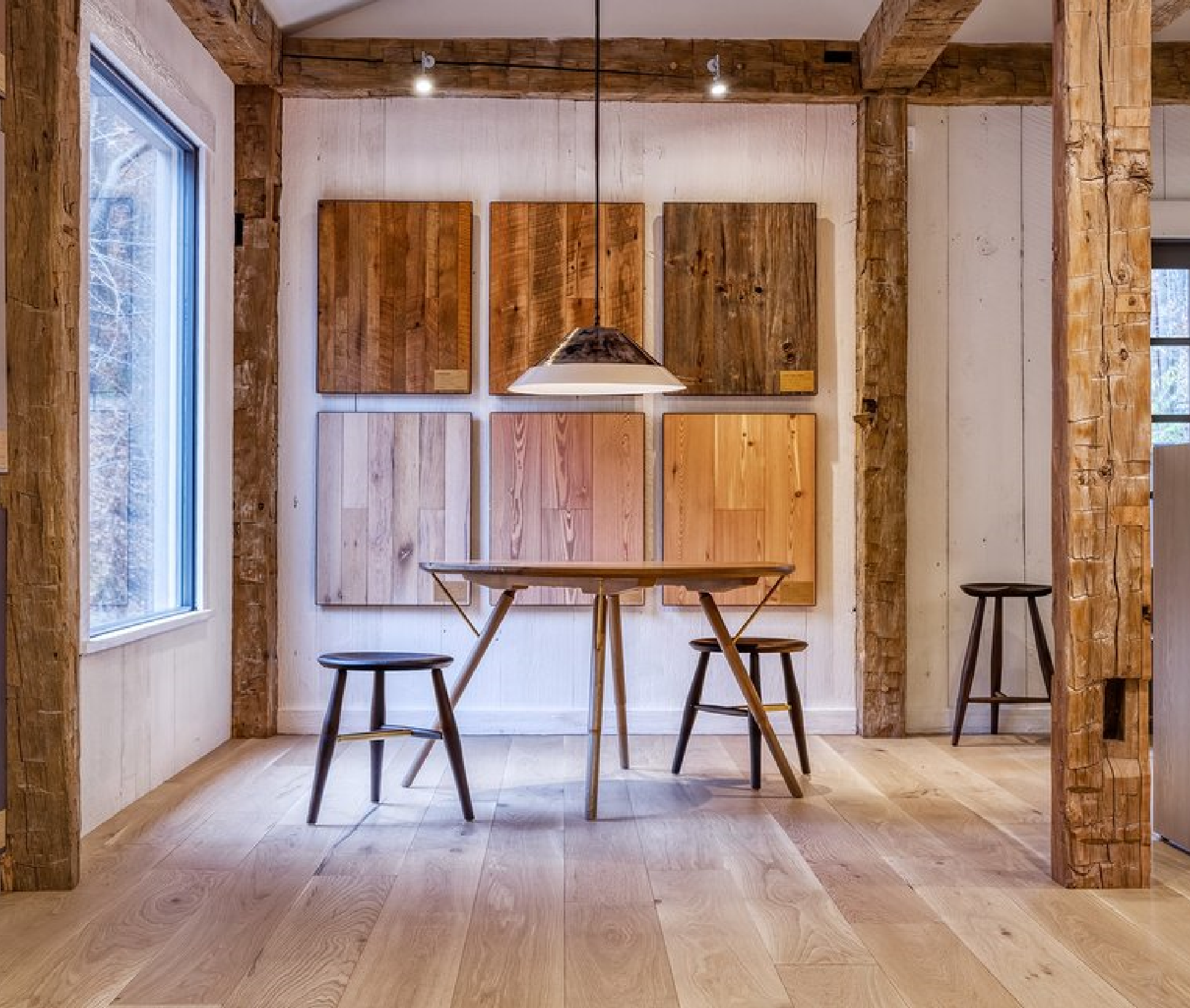 our show room, cosy wooden place. two chairs and table surounded by wooden walls